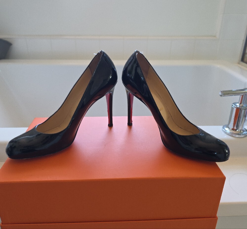 Christian Louboutin Black Patent Leather Round-Toe Pumps